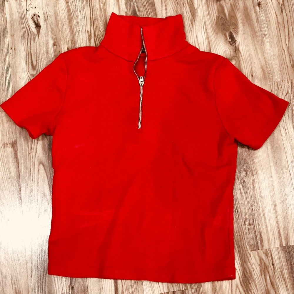A red Brandy melville shirt.